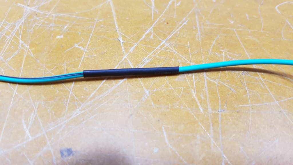 wire join covered with heat shrink tubing