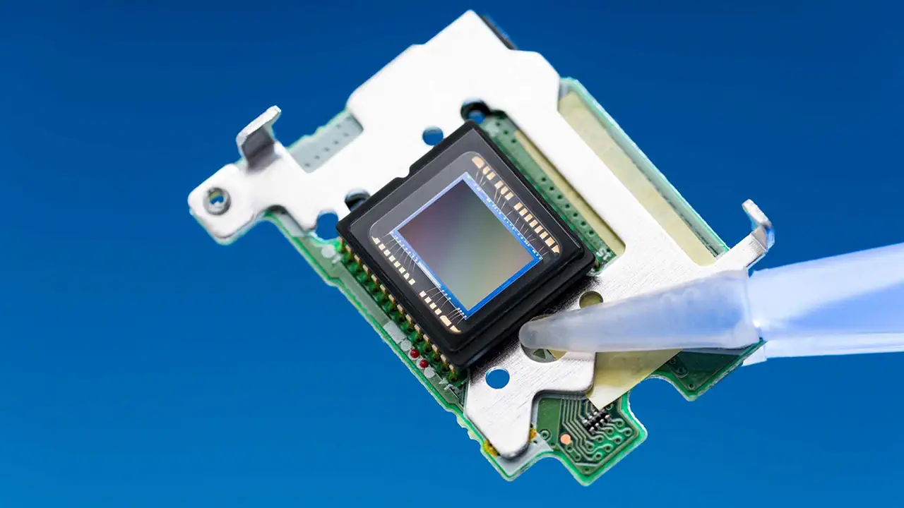 An image/imaging sensor from inside a camera.